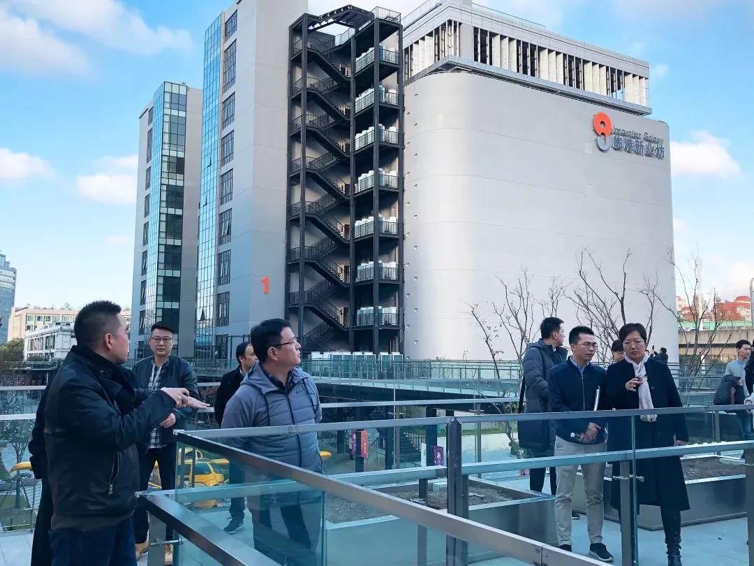 上海市体育局局长徐彬一行调研宝山新业坊源创